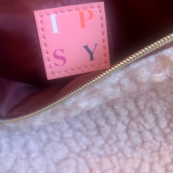 Fuzzy pink makeup bag with maroon zipper pull and inner lining - Picture 2 of 4